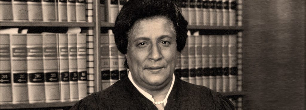 Constance Baker Motley in a law library