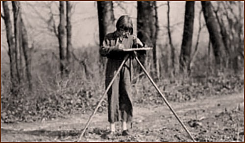 Young girl surveying and collecting soil samples.