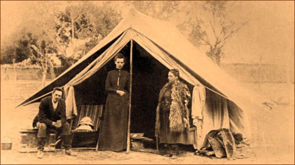 Isabella Bird in her tent while traveling through 19th-century Iran